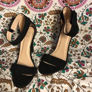 Black strapped heels